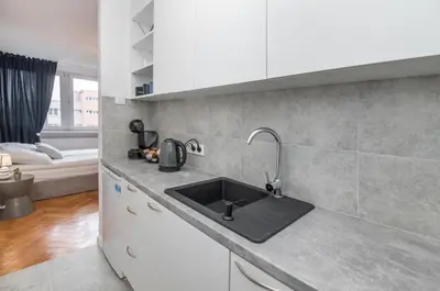 Kuchnia lub aneks kuchenny w obiekcie Apartament Dworcowa 24