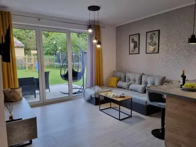 Część wypoczynkowa w obiekcie Domek pod świerkami -Apartament świerkowy IV