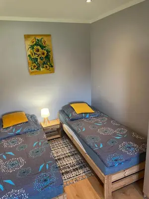 Łóżko lub łóżka w pokoju w obiekcie Domki z Widokiem