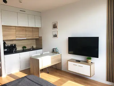 Telewizja i/lub zestaw kina domowego w obiekcie Apartimento Hydral Luna