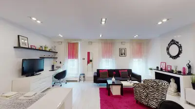 Telewizja i/lub zestaw kina domowego w obiekcie Pink Apartment Rydygiera 2A Tectum Apartments