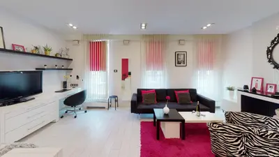 Telewizja i/lub zestaw kina domowego w obiekcie Pink Apartment Rydygiera 2A Tectum Apartments