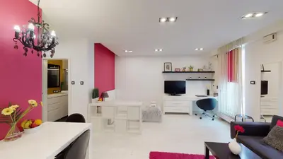 Telewizja i/lub zestaw kina domowego w obiekcie Pink Apartment Rydygiera 2A Tectum Apartments