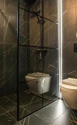 Łazienka w obiekcie Domki Nad Stawami z Jacuzzi i Sauną 2