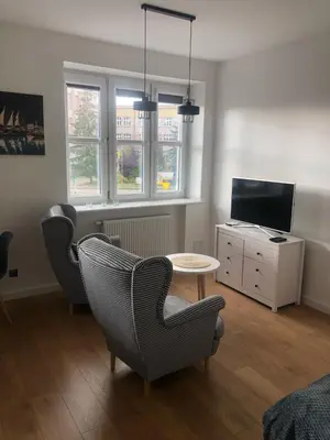 Telewizja i/lub zestaw kina domowego w obiekcie Apartament BROWARNY II