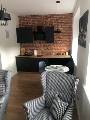 Kuchnia lub aneks kuchenny w obiekcie Apartament BROWARNY II
