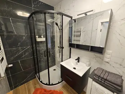 Łazienka w obiekcie MICHALCZYKA APARTAMENT
