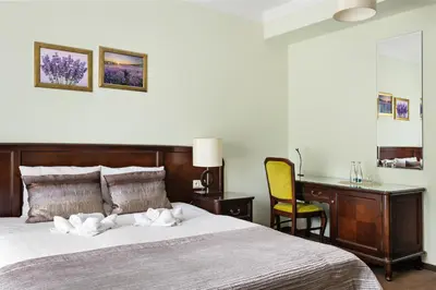 Łóżko lub łóżka w pokoju w obiekcie Hotel Spa Laskowo