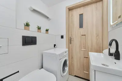 Łazienka w obiekcie Cozy Old Town Studio for 4 Guests in Wrocław by Noclegi Renters