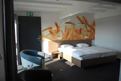 Łóżko lub łóżka w pokoju w obiekcie Stary Młyn