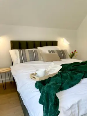 Łóżko lub łóżka w pokoju w obiekcie MINIMAL. Dom całoroczny w górach