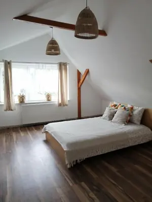 Łóżko lub łóżka w pokoju w obiekcie Sielskie Klimaty