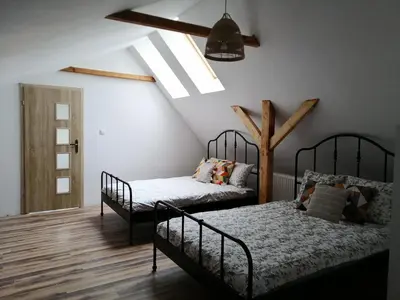 Łóżko lub łóżka w pokoju w obiekcie Sielskie Klimaty