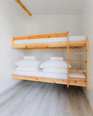 Łóżko lub łóżka w pokoju w obiekcie Domki Wrocław