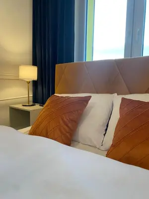 Łóżko lub łóżka w pokoju w obiekcie Tabago Studio 13 K-K Wierzbowa