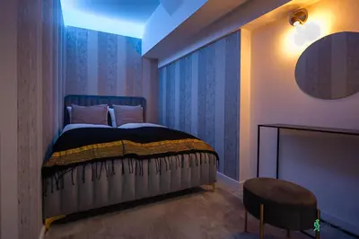 Łóżko lub łóżka w pokoju w obiekcie Apartament Pod Ratuszem II