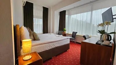 Łóżko lub łóżka w pokoju w obiekcie Willa Furtak