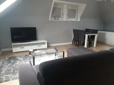 Telewizja i/lub zestaw kina domowego w obiekcie ApartHenryk1