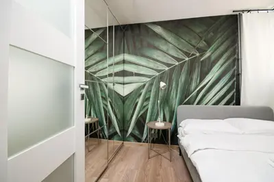 Łóżko lub łóżka w pokoju w obiekcie Rynek Wrocław Comfort Apartment by BookingHost