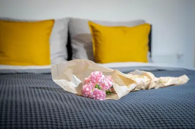 Łóżko lub łóżka w pokoju w obiekcie Apartament w Śródmieściu Odnowa