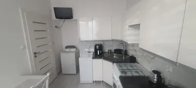 Kuchnia lub aneks kuchenny w obiekcie Apartament TRINI