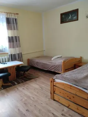 Łóżko lub łóżka w pokoju w obiekcie Zacisze Sokolec