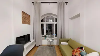 Telewizja i/lub zestaw kina domowego w obiekcie APARTHOTEL TECTUM