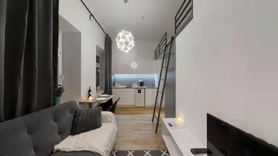 Łóżko lub łóżka w pokoju w obiekcie APARTHOTEL TECTUM