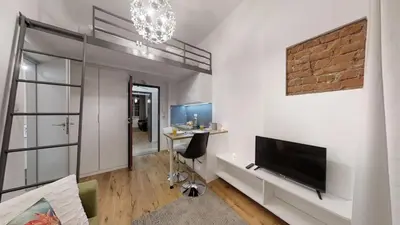 Telewizja i/lub zestaw kina domowego w obiekcie APARTHOTEL TECTUM