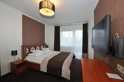 Telewizja i/lub zestaw kina domowego w obiekcie Hotel Linder