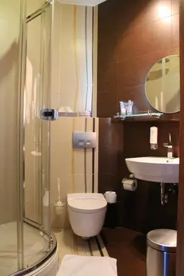 Łazienka w obiekcie Hotel Linder