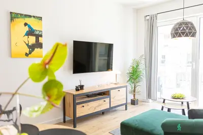 Telewizja i/lub zestaw kina domowego w obiekcie Apartament Bluszczowy, MyWeek