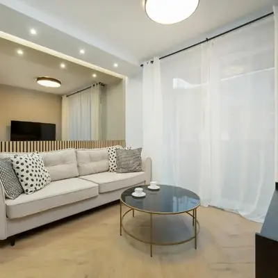 Black and Beige Apartment with Balcony and Parking in Wrocław by Noclegi Renters