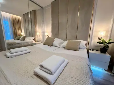 Łóżko lub łóżka w pokoju w obiekcie HO!HOUSE Księcia Witolda