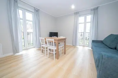Telewizja i/lub zestaw kina domowego w obiekcie VacationClub - Zdrojowa 7 Apartament 3