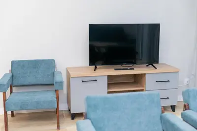 Telewizja i/lub zestaw kina domowego w obiekcie VacationClub - Zdrojowa 7 Apartament 4