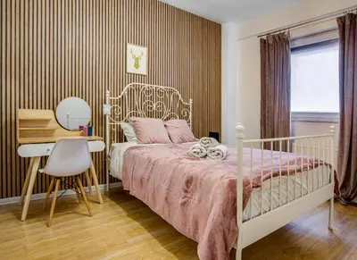 Łóżko lub łóżka w pokoju w obiekcie NiceApart near Old Town