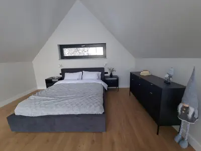 Łóżko lub łóżka w pokoju w obiekcie Green House Jugów