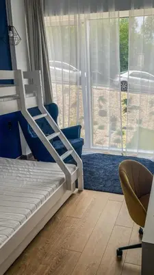 Łóżko lub łóżka w pokoju w obiekcie Biała Perła Czarna Góra Resort Apartament 102