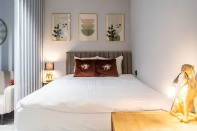 Łóżko lub łóżka w pokoju w obiekcie Apartament DESTINO Gliwice - nowe osiedle, parking, klimatyzacja