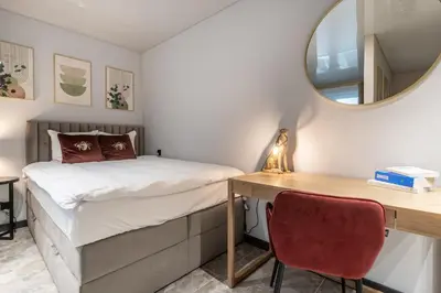Łóżko lub łóżka w pokoju w obiekcie Apartament DESTINO Gliwice - nowe osiedle, parking, klimatyzacja