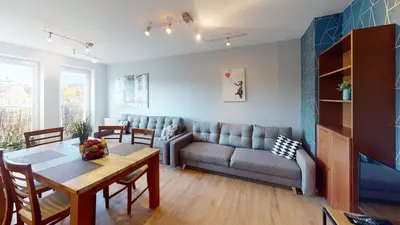 Część wypoczynkowa w obiekcie Family House Pomorska 32 Centrum Tectum Apartments