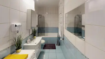 Łazienka w obiekcie Family House Pomorska 32 Centrum Tectum Apartments