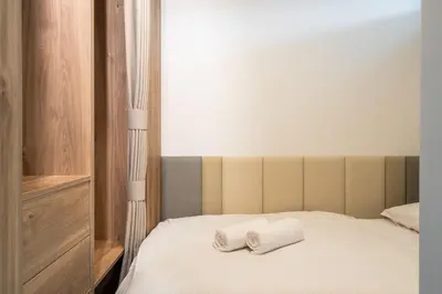 Łóżko lub łóżka w pokoju w obiekcie RentPlanet - Kępa Mieszczańska II