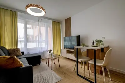 Telewizja i/lub zestaw kina domowego w obiekcie RentPlanet - Kępa Mieszczańska II