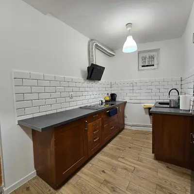 Kuchnia lub aneks kuchenny w obiekcie Apartament Tuwima 1