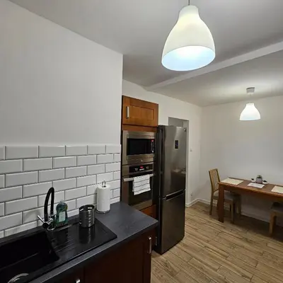 Kuchnia lub aneks kuchenny w obiekcie Apartament Tuwima 1