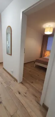 Łóżko lub łóżka w pokoju w obiekcie Apartament Roanta