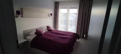 Łóżko lub łóżka w pokoju w obiekcie Czarna Góra Resort Apartament na Skarpie