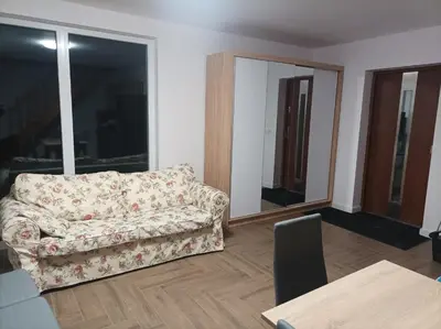 Łóżko lub łóżka w pokoju w obiekcie Lille Skandinavien